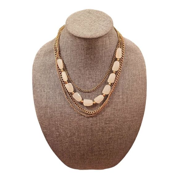 Sophia's Golden Elegance: A Four-Layered White Stone Bead Statement Necklace - Picture 5 of 10